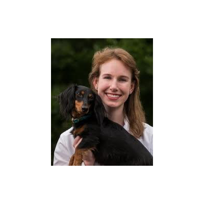 woman holding dog